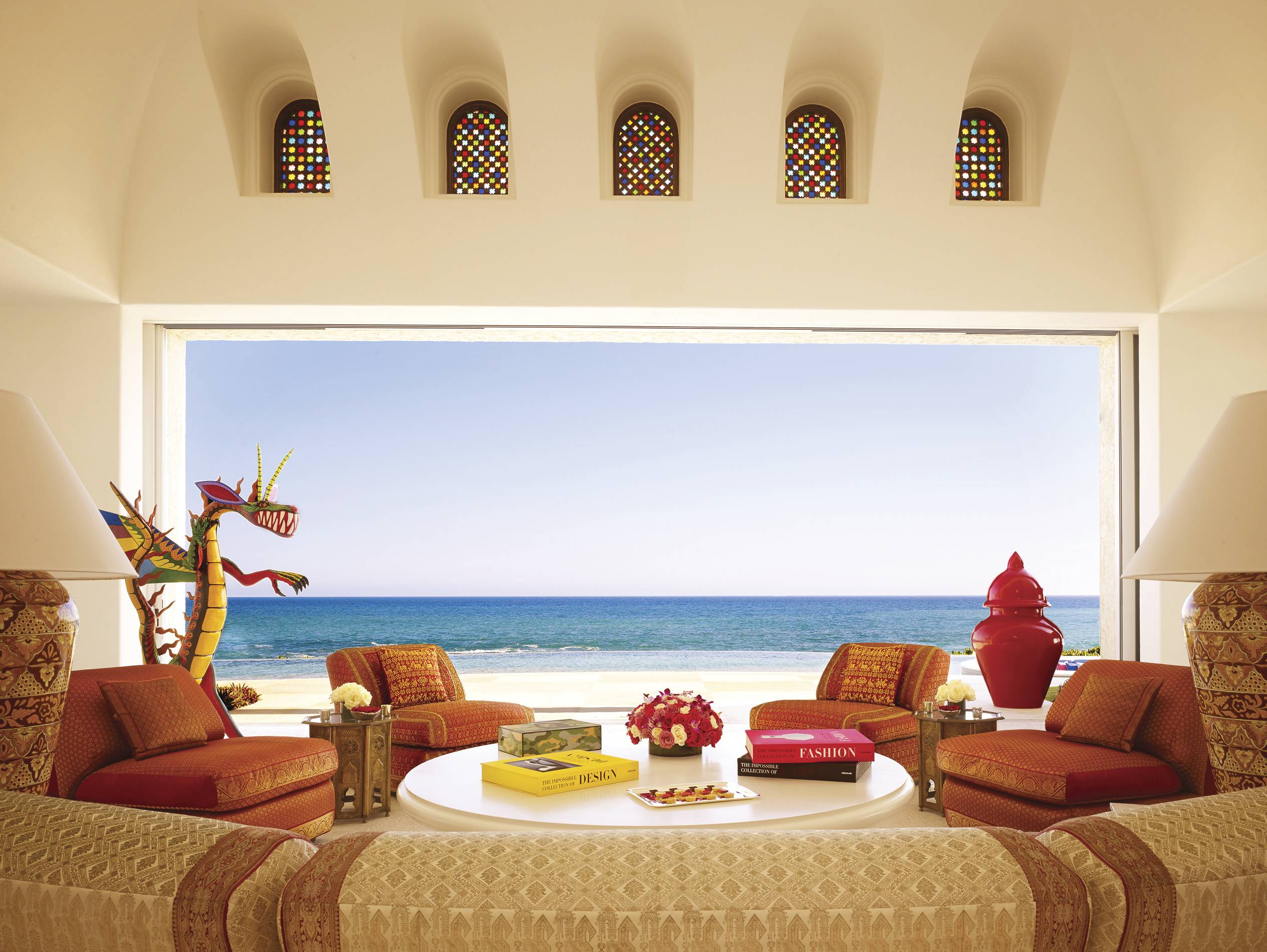 The living room of the Ty Warner Mansion emphasizes its oceanfront locale.